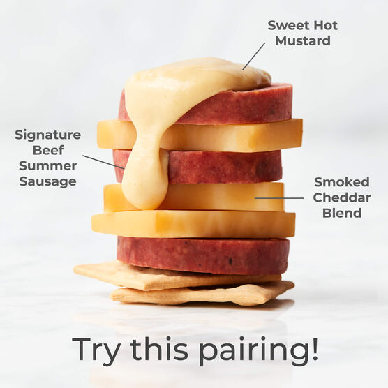 Hickory Farms smoked cheddar cheese stacked with top rated summer sausage and sweet hot mustard