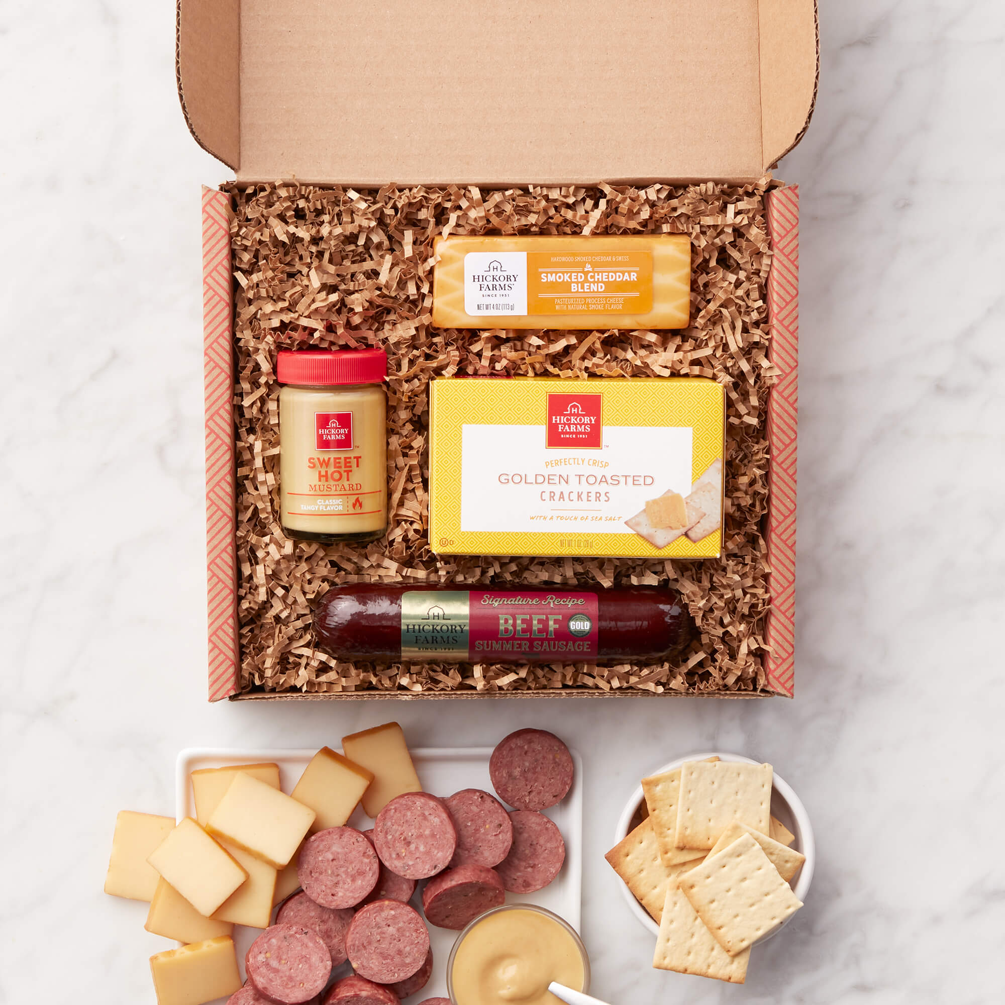 Signature Beef Sampler | The Signature Beef Sampler Gift Box includes summer sausage, various cheese, and crackers.
